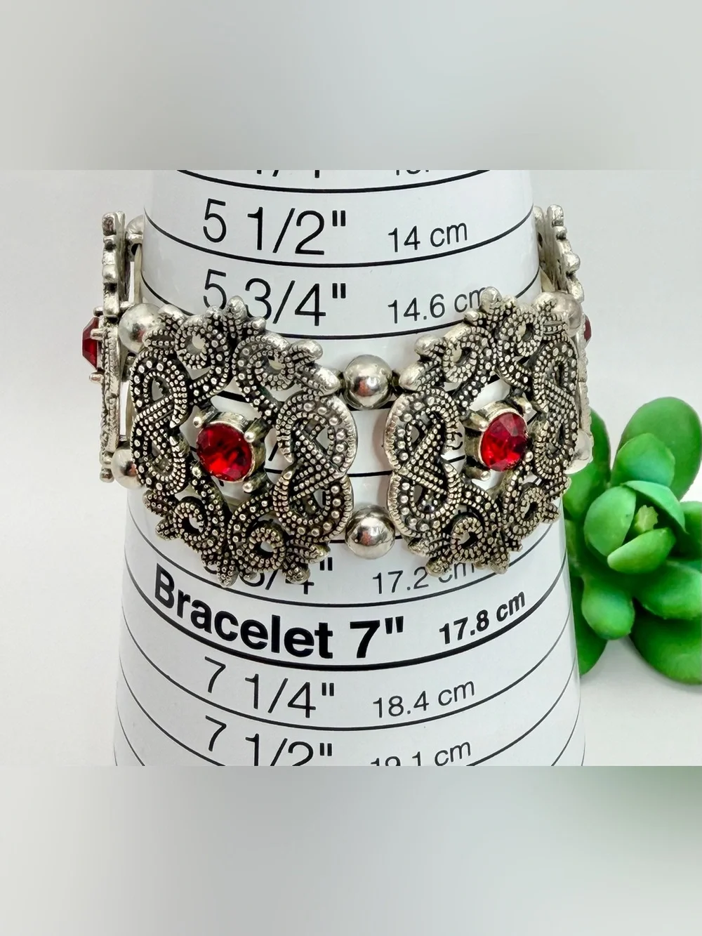 Vintage-Inspired Silver Tone Bracelet with Red Crystal Accents